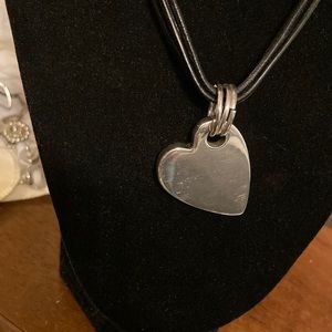 Heavy Sterling silver heart pendant on multilayered cords